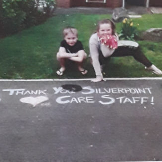 Children with their chalk art thank you for Silverpoint Court