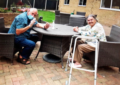 Silverpoint Court residents having a socially distance visit from a family member