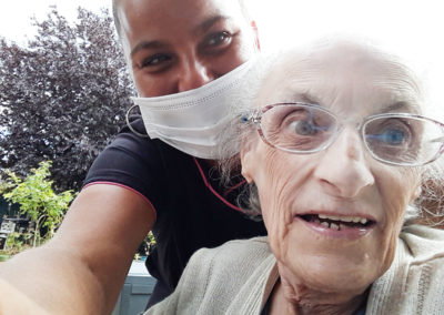 Silverpoint Court selfie photo with a resident and carer