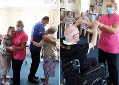 Residents and staff dancing together at Silverpoint Court Residential Care Home
