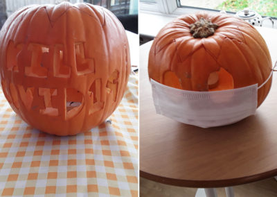 Two decorated and carved pumpkins