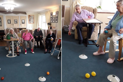 Residents playing indoor bowls at Silverpoint Court Residential Care Home