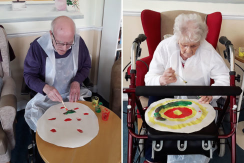 Silverpoint Court Residential Care Home residents painting paper hats