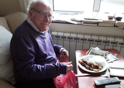 Resident with his pancakes on Pancake Day at Silverpoint Court Residential Care Home