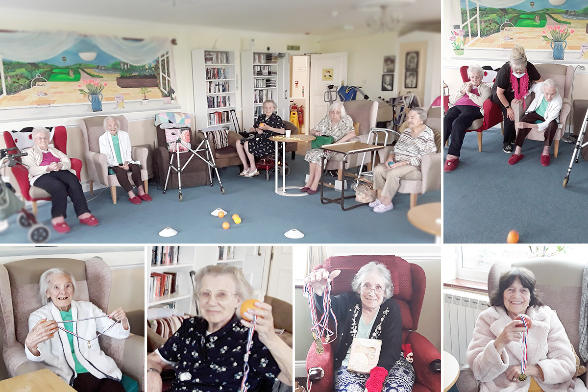 Boccia game and prize winners with their medals at Silverpoint Court Residential Care Home