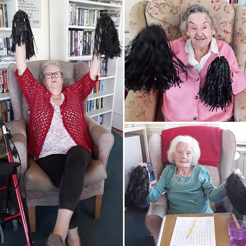 Silverpoint Court Residential Care Home ladies exercising with pom poms
