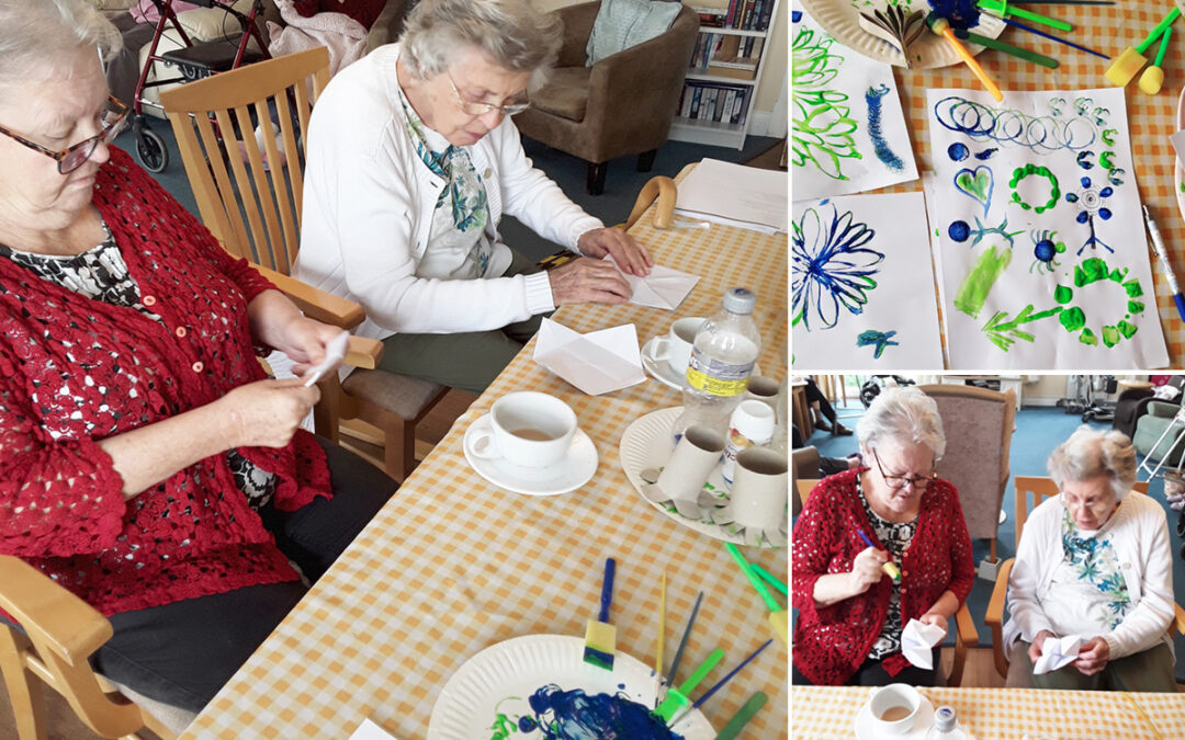 Paper fortune tellers and paints at Silverpoint Court Residential Care Home
