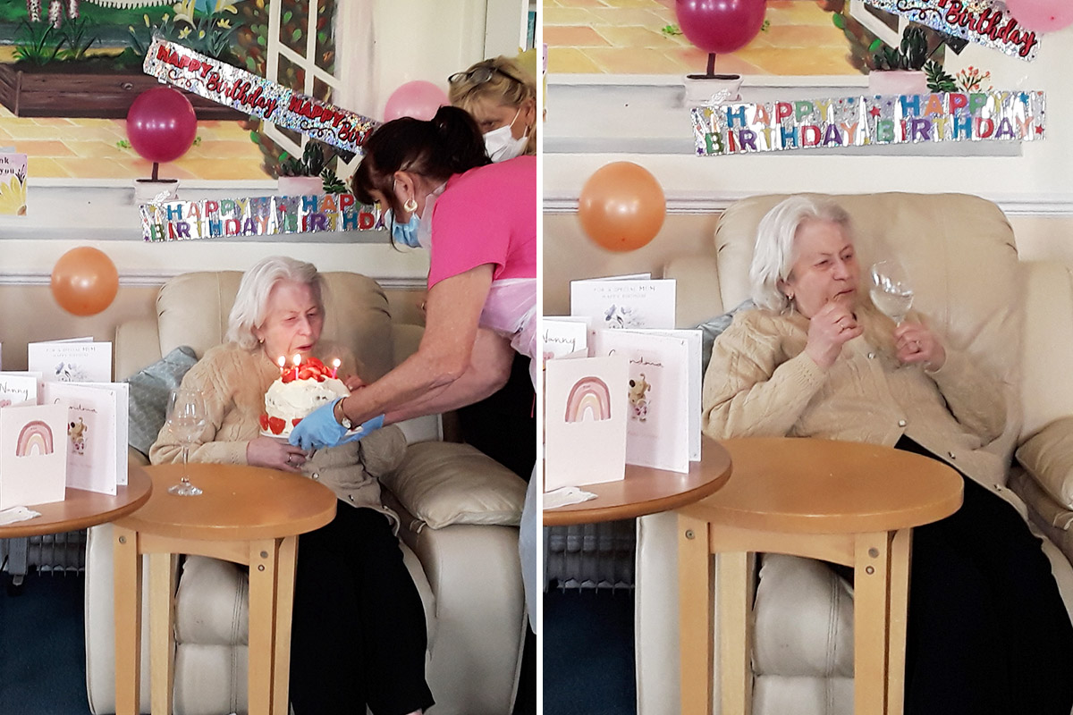 Maureen enjoying her birthday cake and a glass of wine at Silverpoint Court Residential Care Home