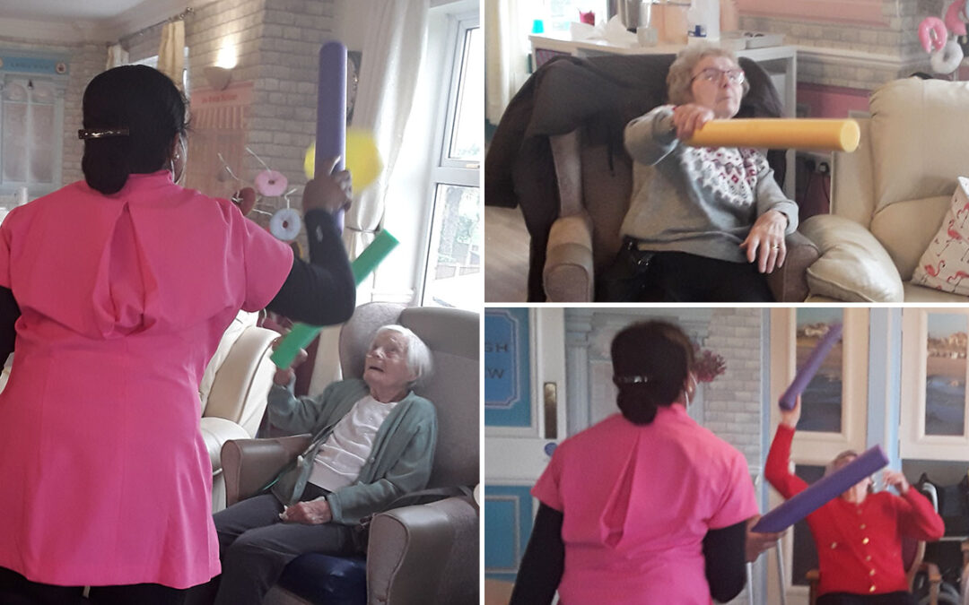 Sharing a balloon game at Silverpoint Court Residential Care Home