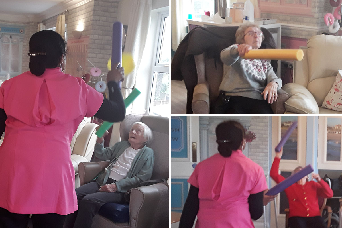 Sharing a balloon game at Silverpoint Court Residential Care Home